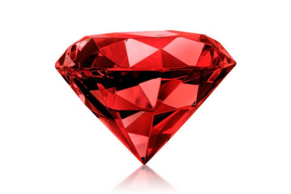 Dazzling diamond red gemstones on white background.